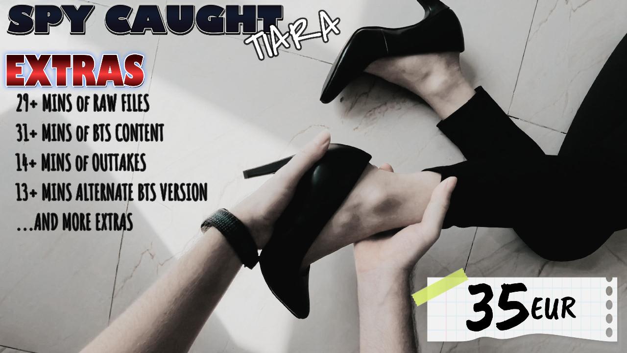 AFC - SPY CAUGHT - TIARA - EXTRAS BUTTON.JPG